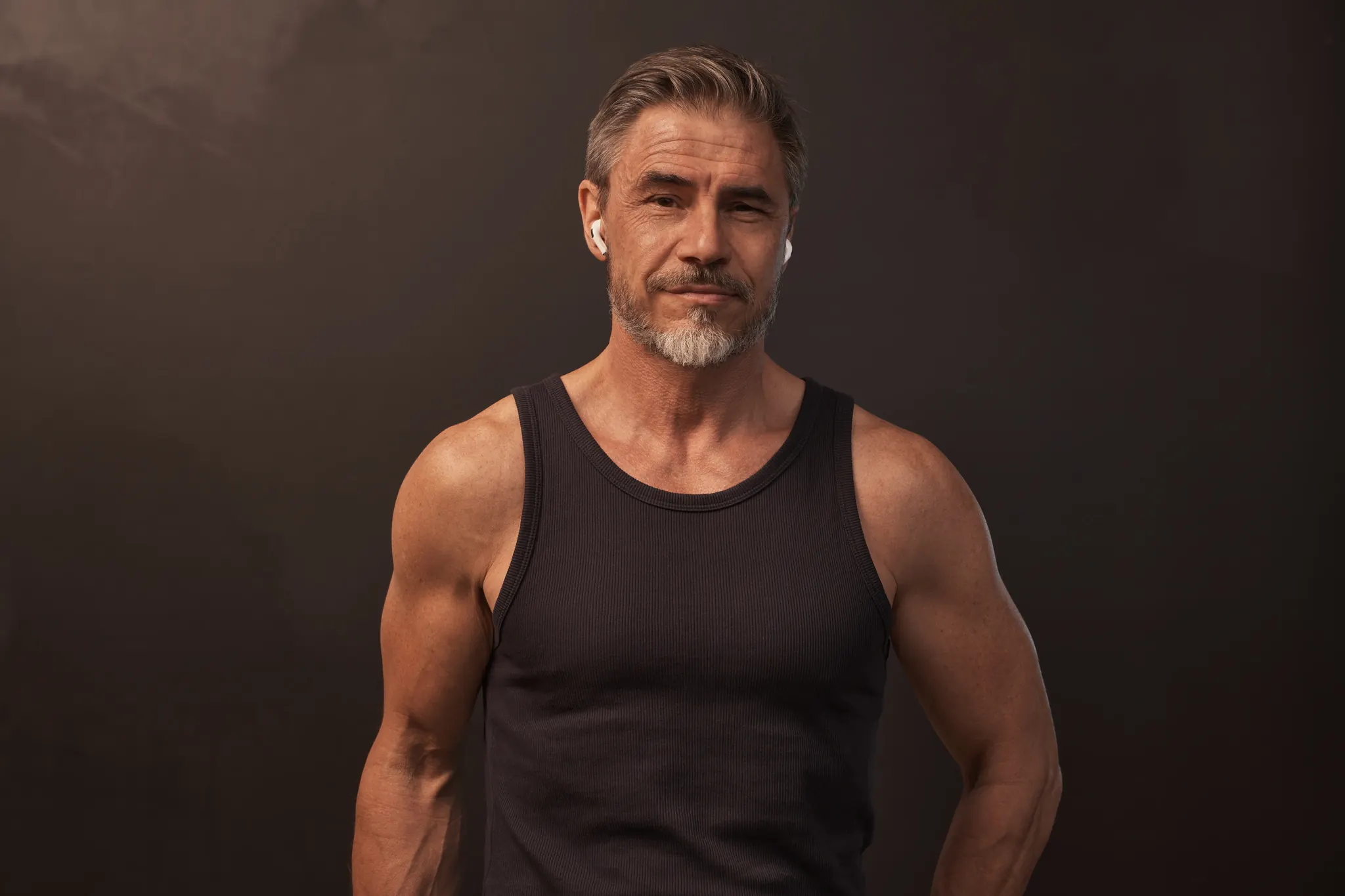 Fit middle-aged man in a tank top — the ideal candidate