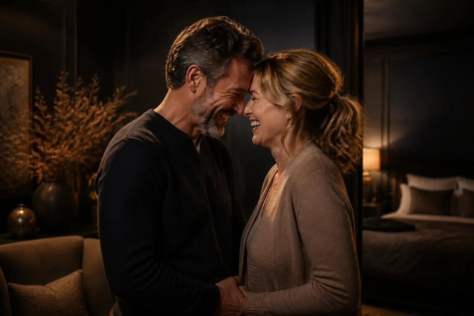 Sexual Wellness — a couple close and laughing together at home